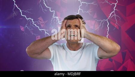 Lightning strikes and stressed man with headache holding head Stock Photo