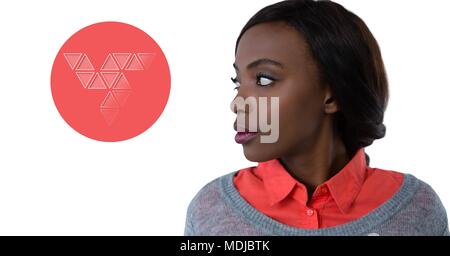 Woman looking at triangle shapes in circle Stock Photo