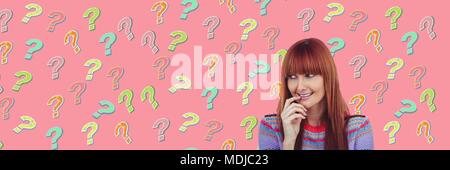 Woman thinking with colorful funky question marks Stock Photo