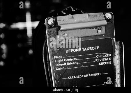 Old-fashioned Pilot's Check List on the Flight Deck of a Boeing 747-400 Stock Photo