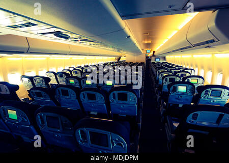 Economy Class of a Boeing 747-400 used for Hajj and Umrah Flights Stock Photo