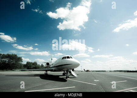 Falcon 2000 business jet is waiting for passengers and ready to go Stock Photo