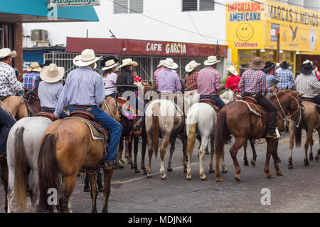 Cabalgata Riders Horses and riders parade through the streets of David, Panama, in the ...