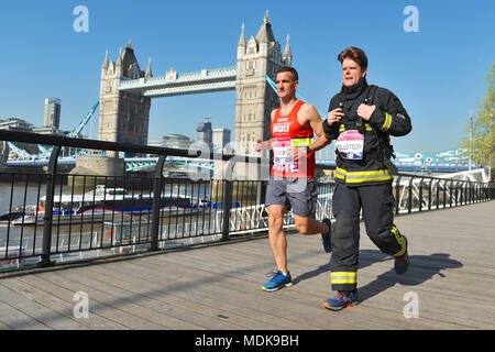 London, UK. 20th April 2018. Mike Dowden (North Kensington Watch Manager) and Guy Tillotson (Paddington Watch Manager) at the Spirit of London, Virgin Money London Marathon pre-race photocall, Tower Hotel, London, UK.    Both men are firefighters who were involved in the Grenfell Tower fire and Tillotson will be running the  first and last mile of the race in full breathing apparatus and uniform which has a combined weight of around 13kg. Credit: Michael Preston/Alamy Live News Stock Photo