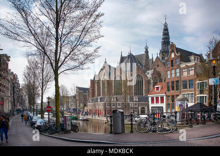 Amsterdam, Holland - 14 April 2018 Typical gabled houses on Damrak street in Amsterdam, Holland, Netherlands Stock Photo
