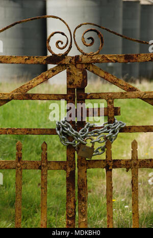 Chained Entry Gates to Old Factory in the Republic Of Ireland Stock Photo