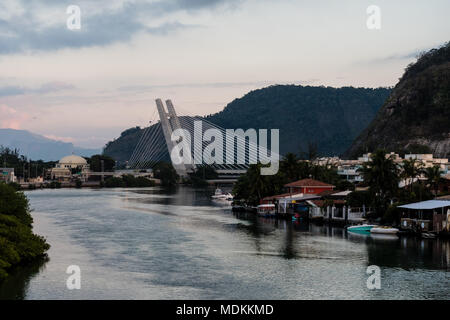 stayed bridge over Marapendi Lagoon during sunrise on cloudy morning, Barra da Tijuca, Rio de Janeiro Stock Photo