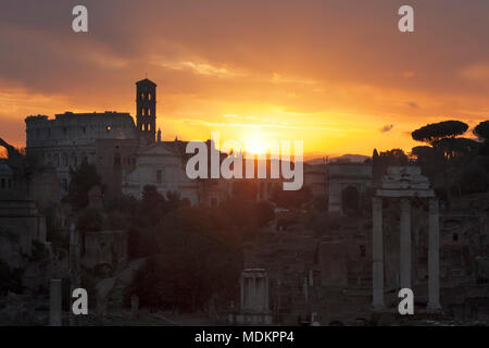 View over the Roman Forum to the Colosseum at sunrise, Foro Romano, Rome, Lazio, Italy Stock Photo