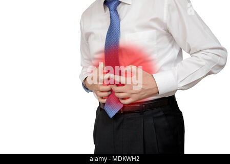 Businessman holding his stomach in pain with stomachache or indigestion Stock Photo