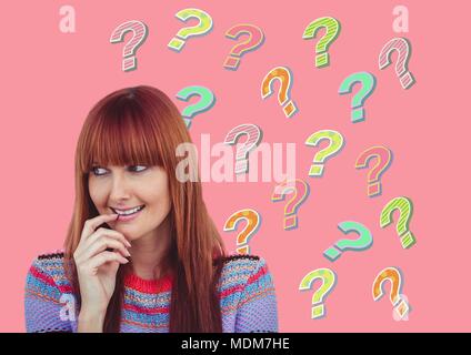 Woman thinking with colorful funky question marks Stock Photo