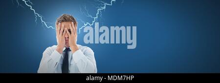 Lightning strikes and stressed man with headache holding head Stock Photo