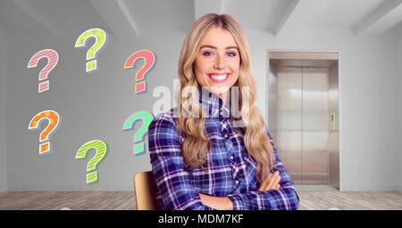 Beautiful Woman thinking with colorful funky question marks Stock Photo