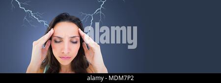 Lightning strikes and stressed woman with headache holding head Stock Photo
