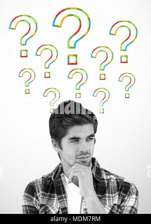 Man thinking with colorful question marks Stock Photo