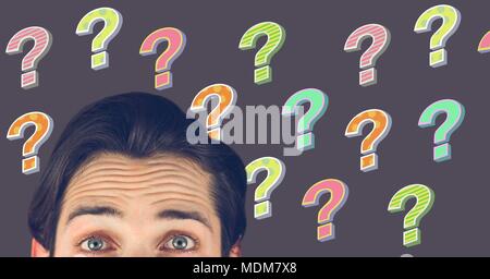 Man thinking with colorful funky question marks Stock Photo