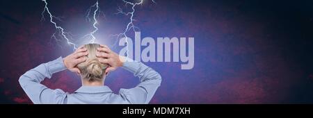 Lightning strikes and stressed woman with headache holding head Stock Photo