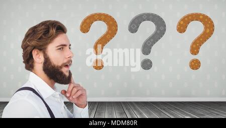 Bearded Man thinking with stitched question marks Stock Photo