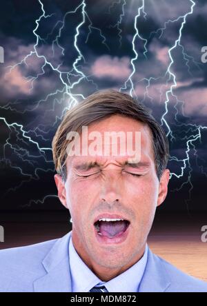 Lightning strikes and stressed man with headache holding head Stock Photo