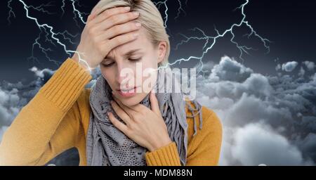 Lightning strikes and stressed woman with headache holding head Stock Photo