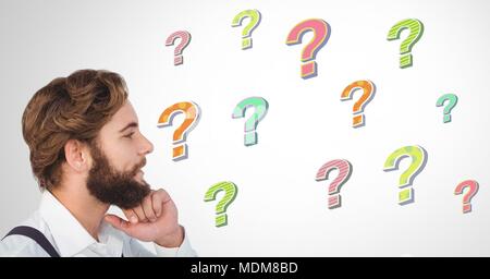 Man thinking with colorful funky question marks Stock Photo