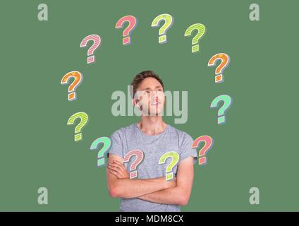 Man with colorful funky question marks in circle Stock Photo