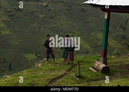 Some kids amused by strangers in a remote town in the mountains of Huehuetenango, Guatemala. Stock Photo