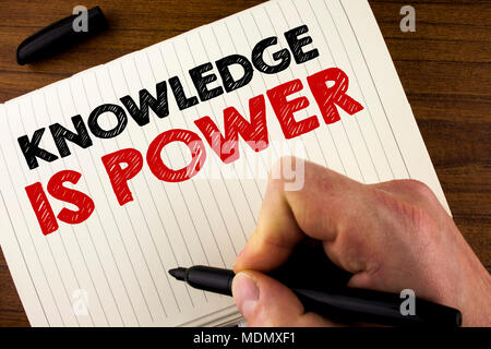 Conceptual hand writing showing Knowledge Is Power. Business photo showcasing learning will give you advantage over others written by Man Notebook Boo Stock Photo