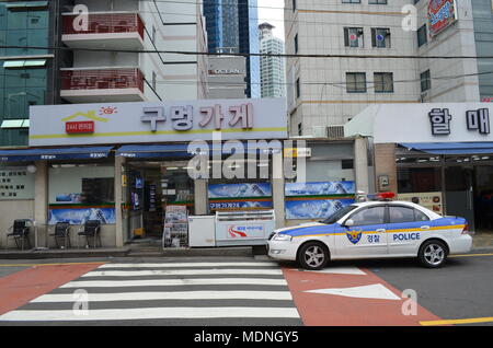 Police car on a street in Busan, South Korea Stock Photo