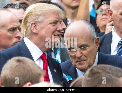 New York, USA, 11 September 2016.  US President Donald Trump talks to former New York Mayor Rudolph Giuliani in this file photo from 9/11/2016 at the September 11 Memorial in New York City.  Giuliani will join Trump's legal team in an effort to resolve the special counsel’s Russia inquiry, it was announced on April 19, 2018. Photo by Enrique Shore / Alamy Stock Photo
