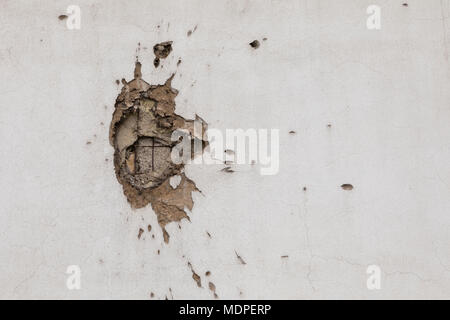 Bullet hole on building wall in Sarajevo Stock Photo