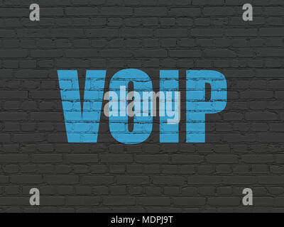 Web design concept: Painted blue text VOIP on Black Brick wall background Stock Photo