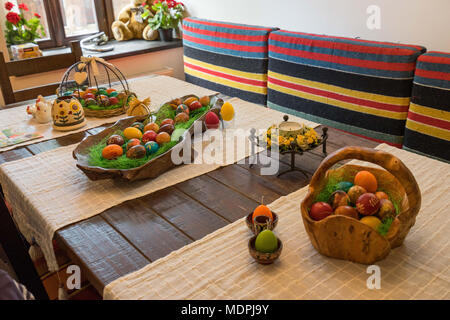 Easter table setting.Holiday Decorations on wooden table. Stock Photo