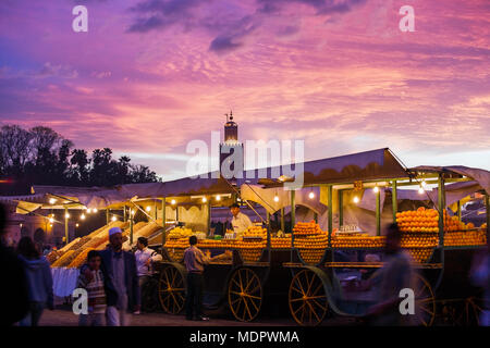 Marrakesh, Morocco; view of the Djemaa el Fna at sunset. Stock Photo