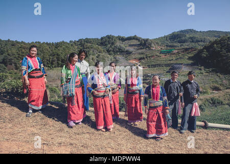 CHIANGMAI THAILAND - JAN10 : group of dara-ang thai hill tribe people standing in domestic village cultivation Stock Photo