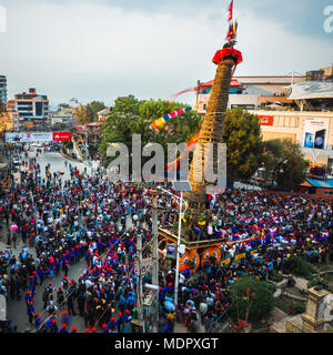 PATAN, NEPAL - APRIL 19, 2018: First day of Rato Machhindranath festival. Rato Machhindranath is a deity worshipped as the God of Rain. Stock Photo