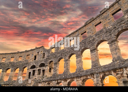 sunset on Roman amphitheatre similar to Colosseum of Rome Stock Photo