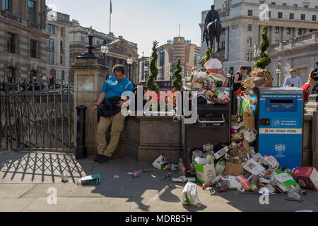 Untypical overflowing rubbish and litter collects over bins and recycling receptacles in Bank Triangle in the City of London - the capital's financial district (aka The Square Mile), on 19th April 2018, in London, England. Stock Photo