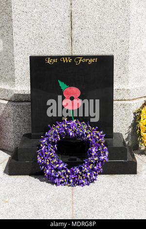 8th May 2017, Bury, Greater Manchester, UK. Two weeks after Anzac Day (April 25th), an Iris flower wreath lies at the foot of Bury war memorial. Stock Photo