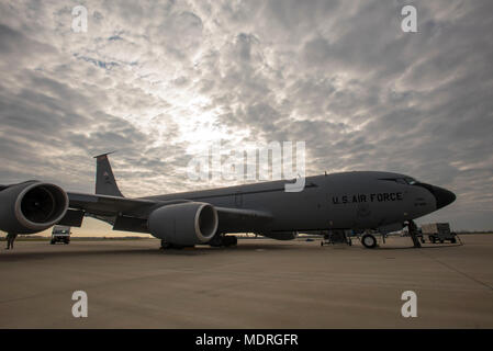 A KC-135 Stratotanker from the 121st Air Refueling Wing sits on the flightline at Rickenbacker Air National Guard Base, Ohio, April 18, 2018.  The KC-135 was being prepared for a mission that partnered with the 180th Fighter Wing’s F-16 Fighting Falcons.  (U.S. Air National Guard photo by Tiffany A Emery) Stock Photo