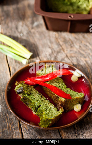Vegetarian omelet with wild garlic and stinging nettles Stock Photo