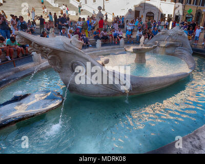 Rome, Italy - July 2017: Fountain of the Ugly Boat at the Spanish Steps Stock Photo