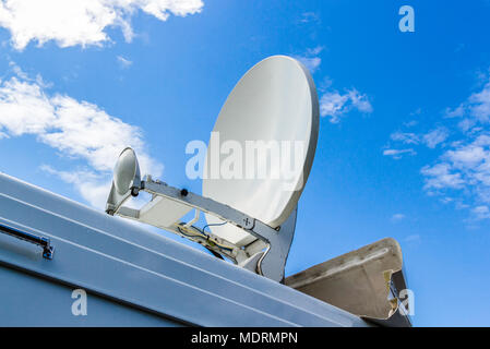 The mobile satellite dish is mounted on the roof of the car Stock Photo