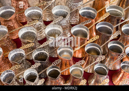Sarajevo, Bosnia-Herzegovina, July 16 2017: Traditional handcrafted copper coffee pots in souvenir shops in Sarajevo