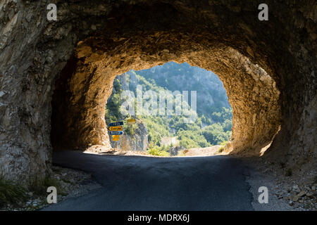 Road junction in a tunnel in Durmitor National Park in Montenegro Stock Photo