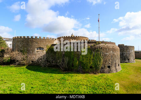 Deal Castle, one of the finest Tudor artillery castles in England. Dry moat, castle, Union Jack flag flying, bright sunshine and blue sky. Stock Photo