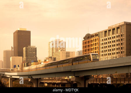 Elevated Yurikamome monorail at Shiodome Area, Shimbashi, Tokyo, Kanto Region, Honshu, Japan Stock Photo