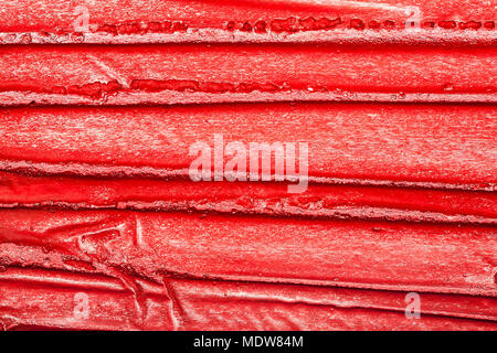 Red bumpy wall stucco texture background, crumpled leather imitation Stock Photo