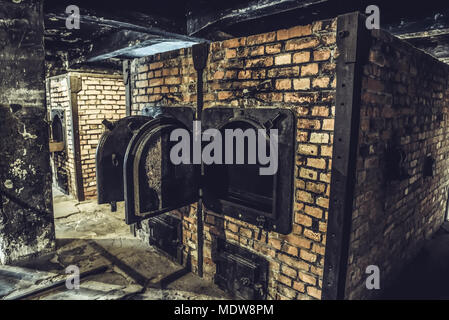 Oswiecim / Poland - 02.15.2018: Crematorium stove in dark basement in  Auschwitz Museum. Stock Photo
