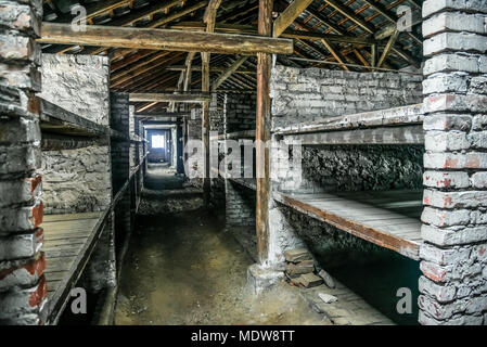 Oswiecim / Poland - 02.15.2018: Prisoner's beds, bunks inside barrack in Auschwitz Birkenau Museum. Stock Photo