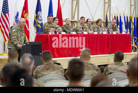 Rick Kell, co-founder of Troops First Foundation, speaks during the Operation Proper Exit town hall on Camp Buehring, Kuwait, Dec. 5, 2017. Operation Proper Exit is a unique initiative designed for wounded warfighters who are thriving in recovery and are capable of returning to theater. (U.S. Army photo by Sgt. David L. Nye/USARCENT PAO) Stock Photo